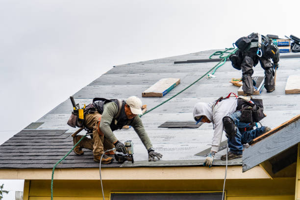 Professional Roofing technician working in New River, VA